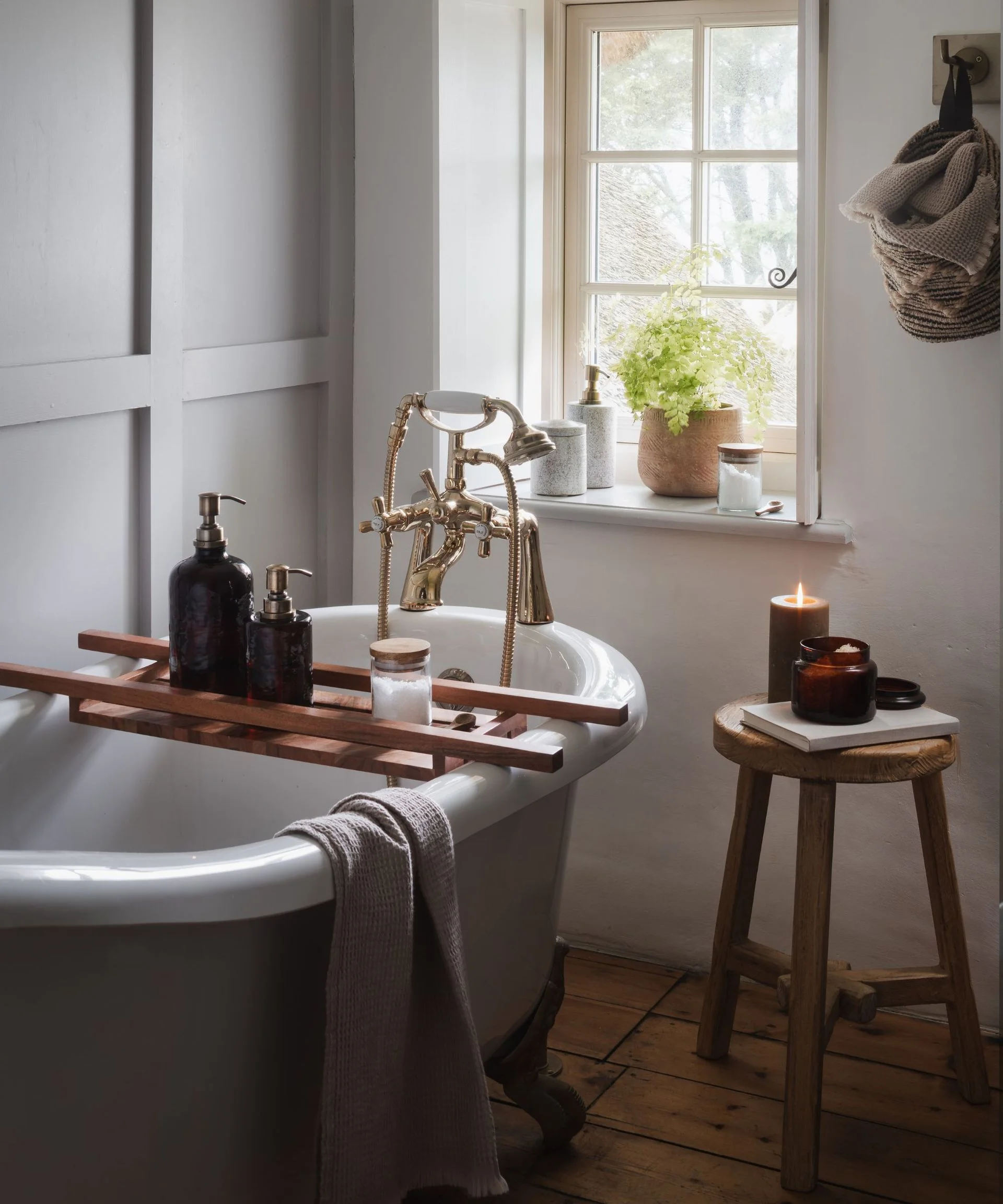 Warm, inviting bathroom with candle