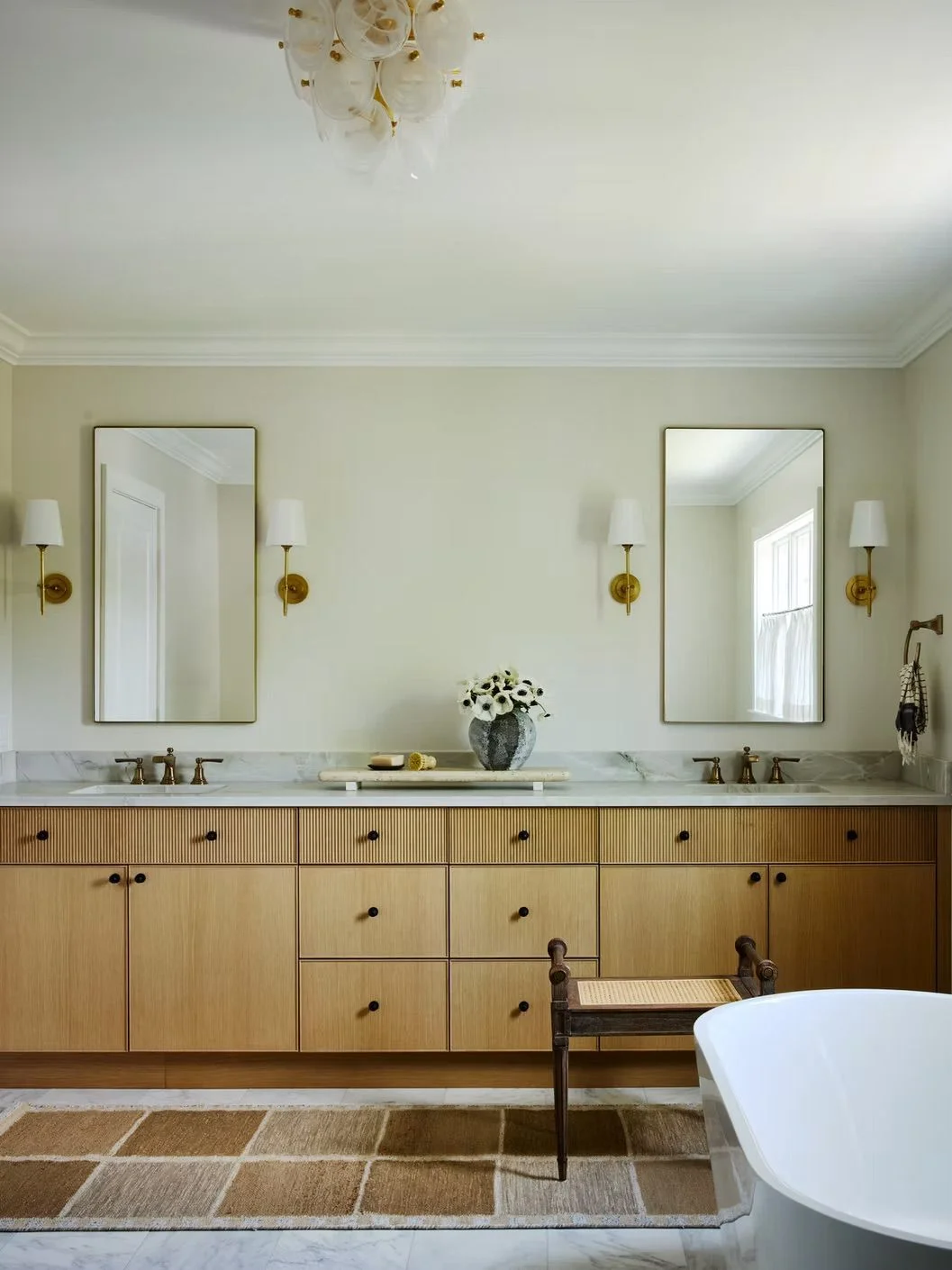 A contemporary bathroom featuring graphic jute runner rug