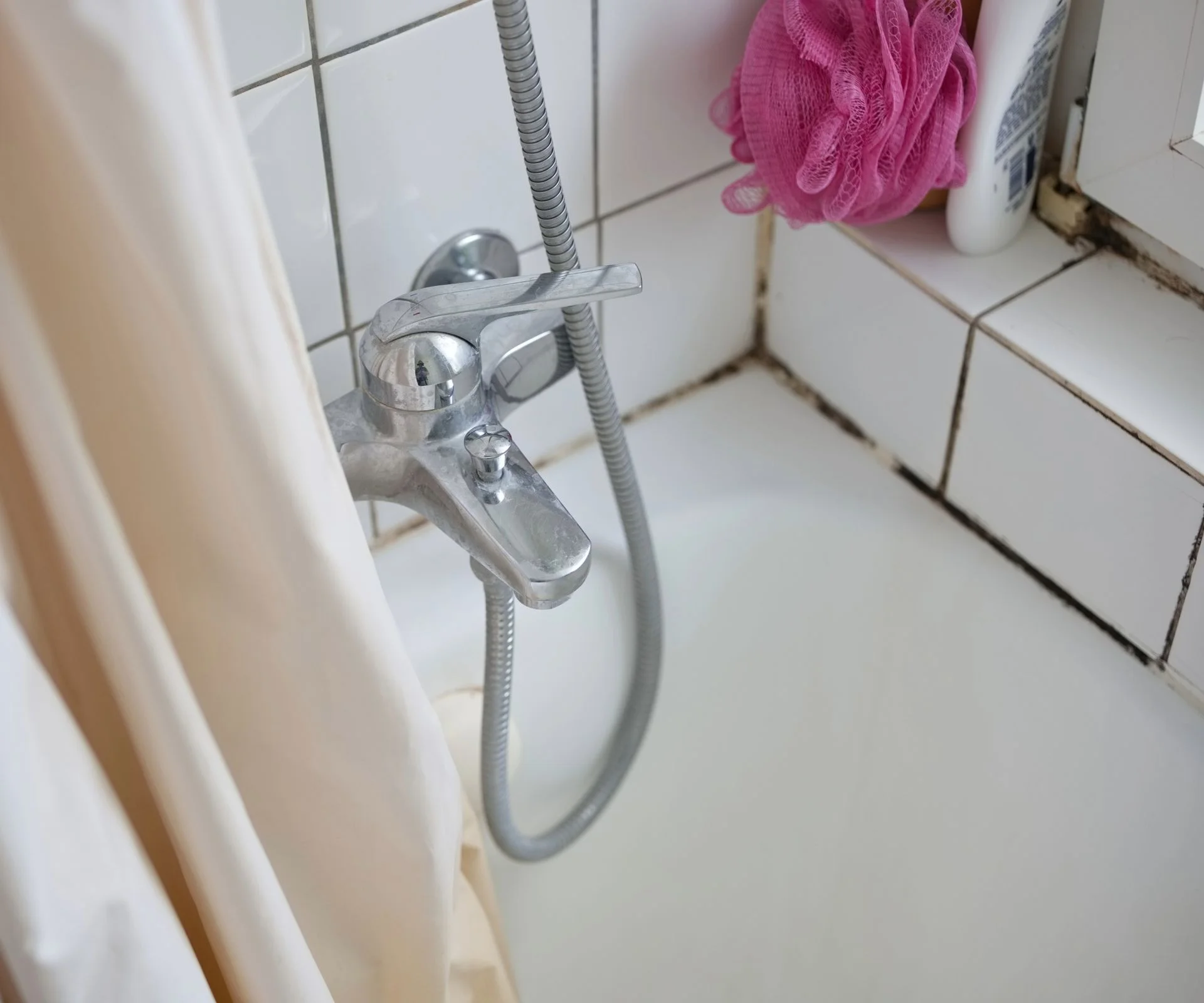 Mould on bathroom silicone around the bath