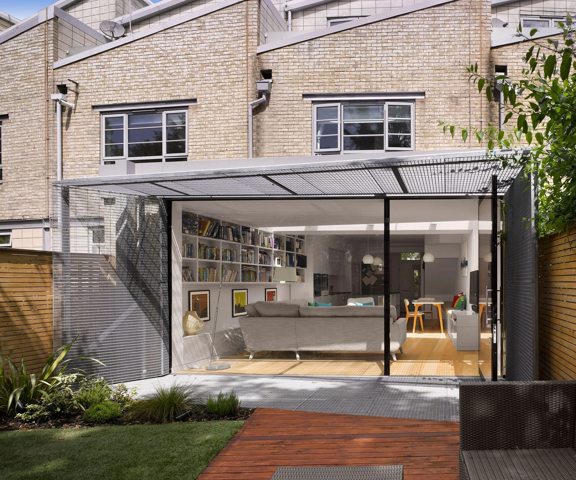 single storey extension with bifold doors and metal grid solar shading