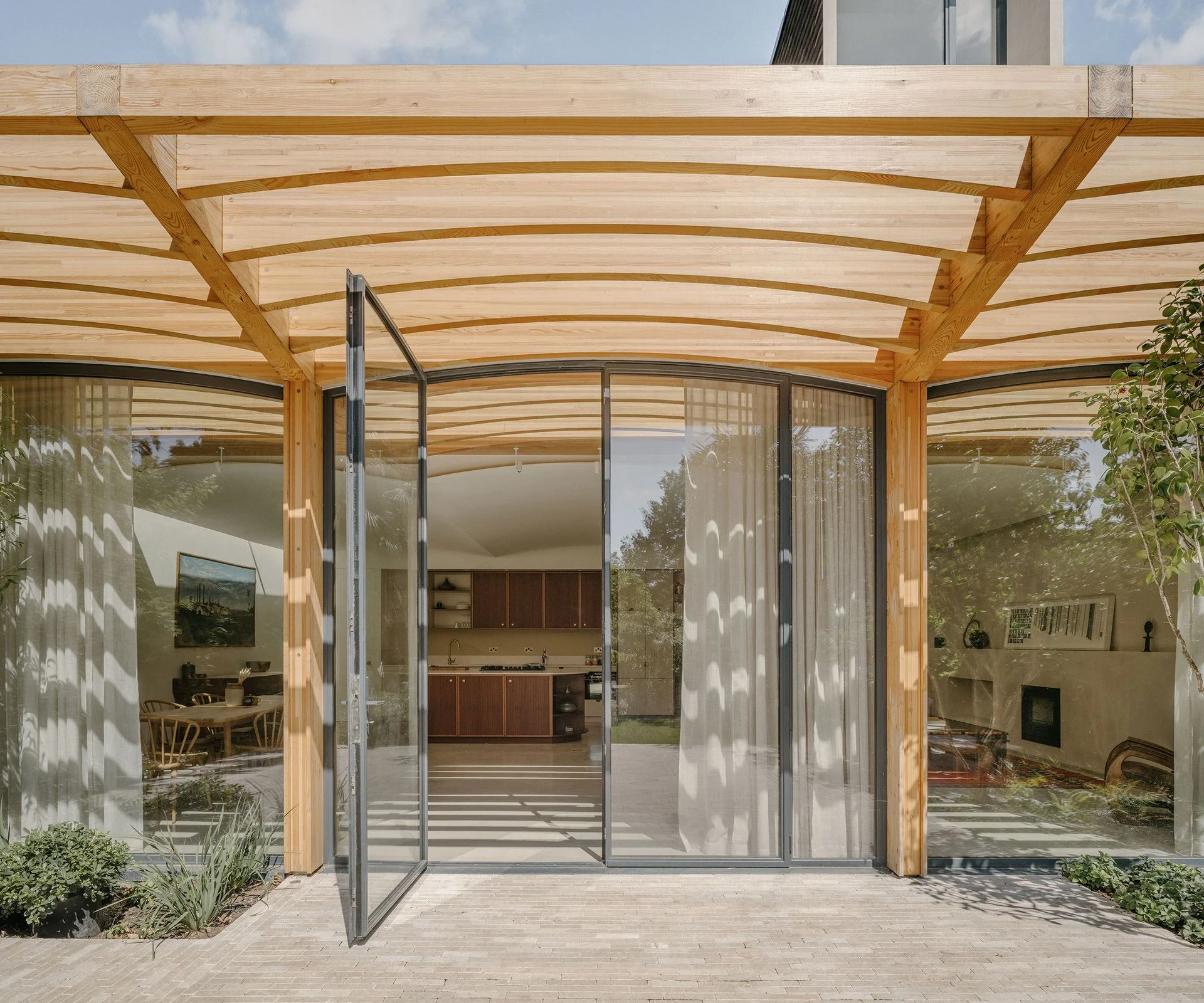 terrace with wooden brise soleil over large bifold doors