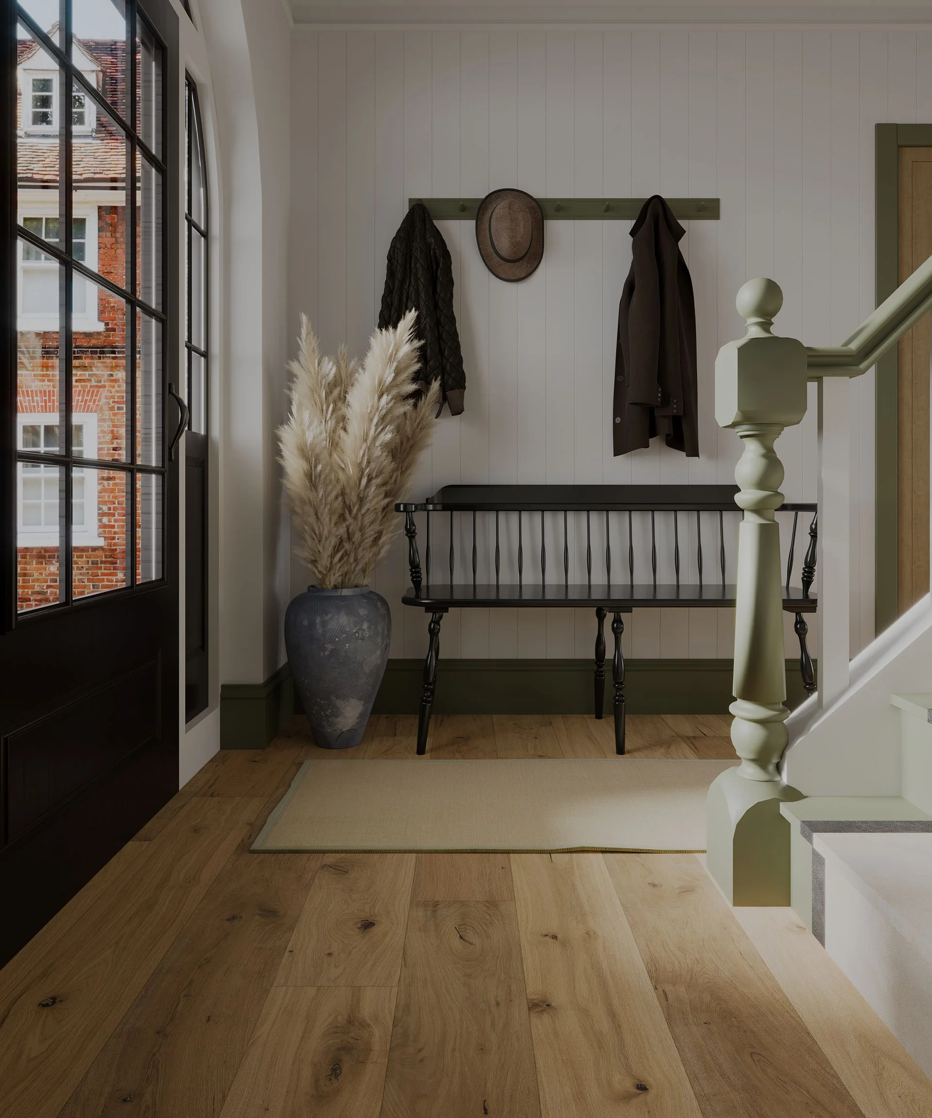 wide plank wooden flooring in entrance hallway