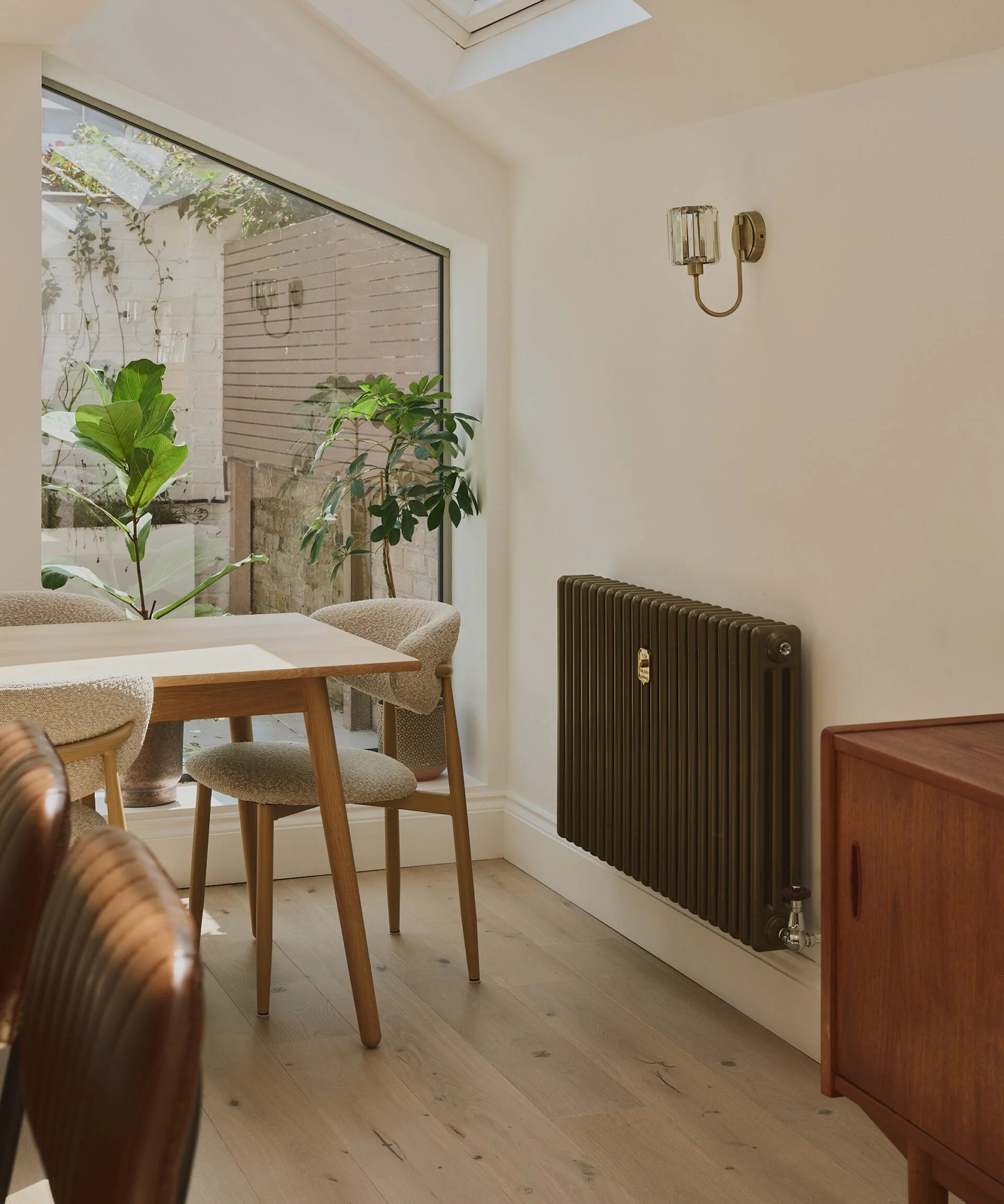 modern side return kitchen extension with pale engineered wooden flooring