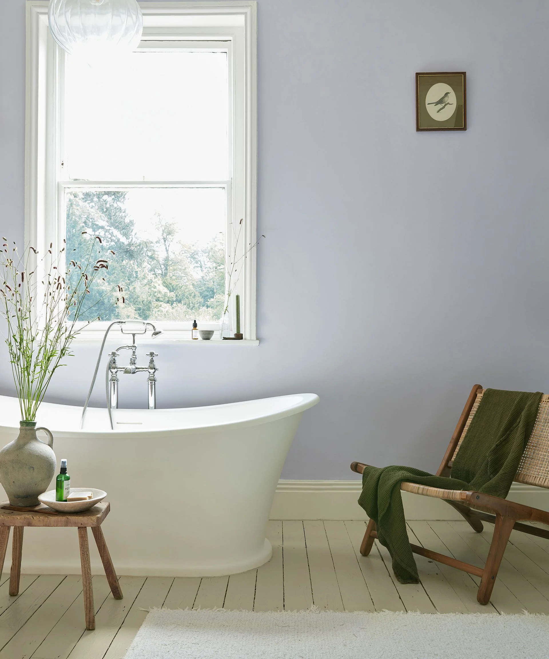 pale lilac bathroom with rolltop bath