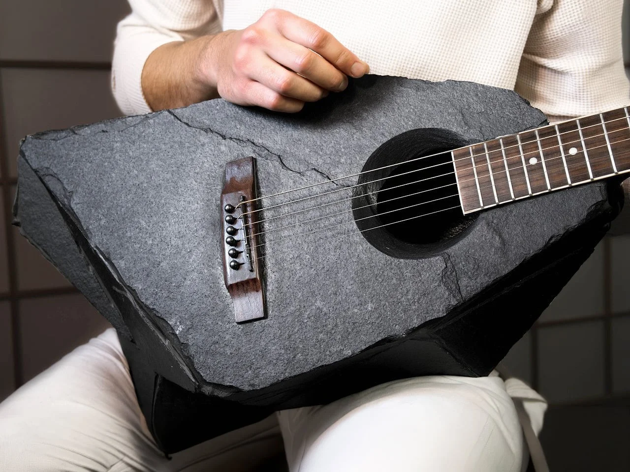 A Guitar Made of Slate: Blending Humor and Craftsmanship in Instrument Design