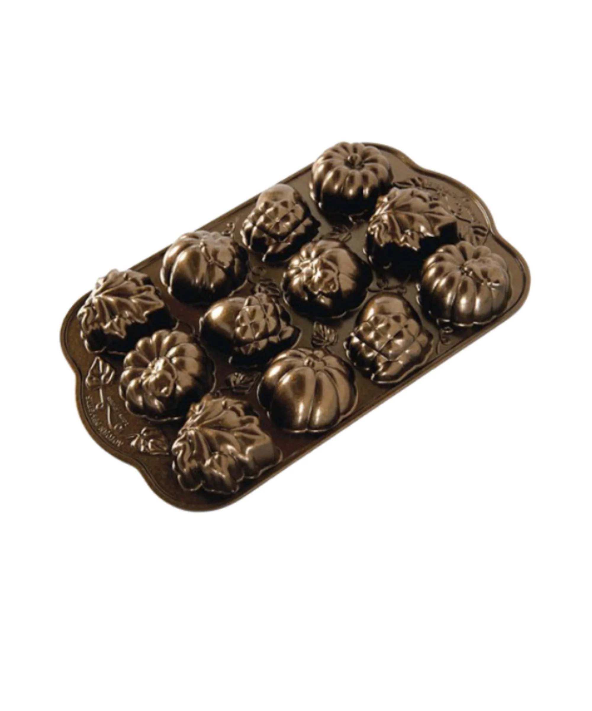 A baking tray with pumpkin shaped indents