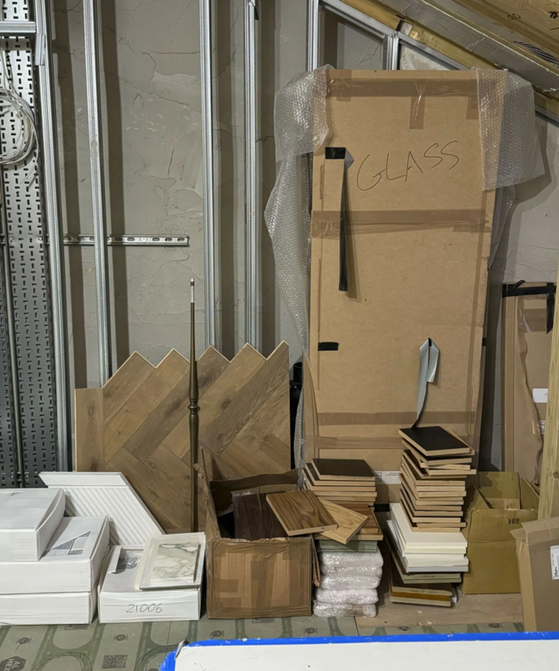 Image of stacked tiles and materials in construction