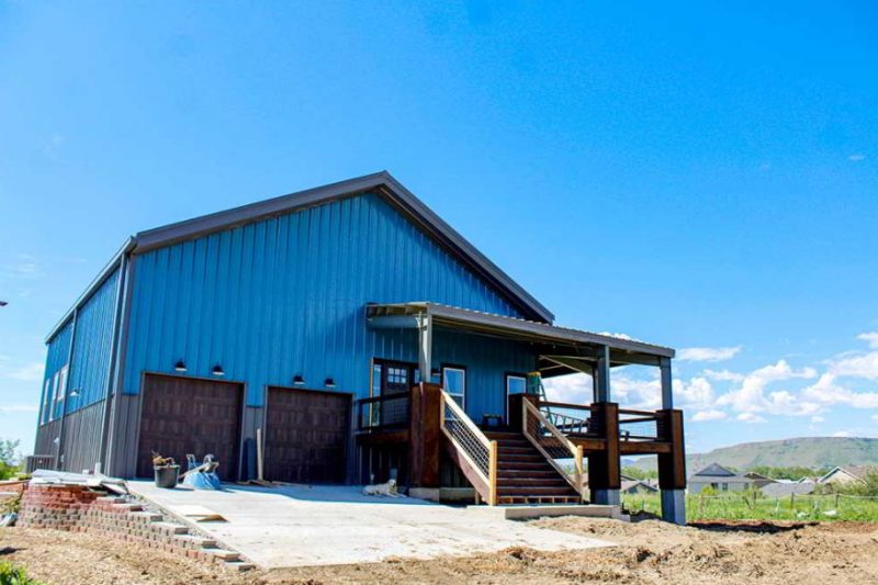 living quarters and two garage doors