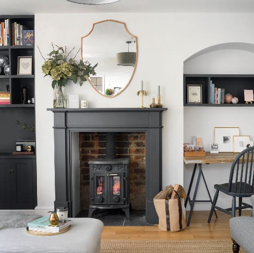 Black Fireplace in White Wall