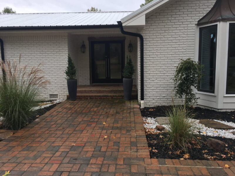 Brick house with black gutters ideas